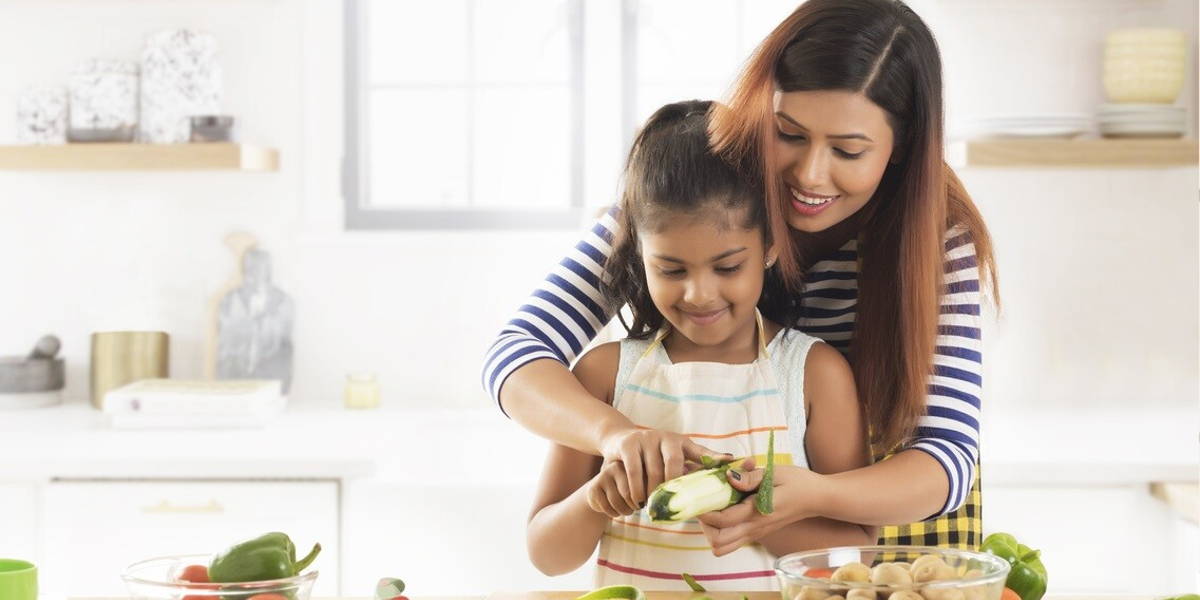 gezond eten vrouw kind keuken
