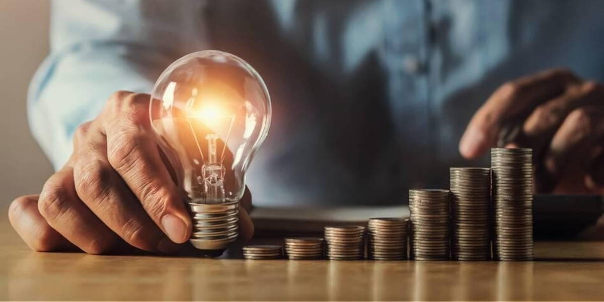 businessman hand holding light bulb. idea concept with innovatio