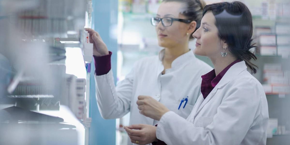 team of pharmacist chemist woman  in pharmacy drugstore