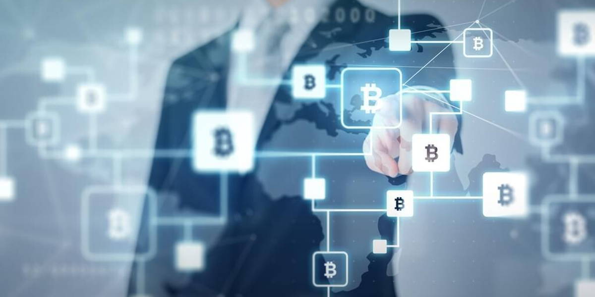 buisnessman with bitcoin block chain hologram