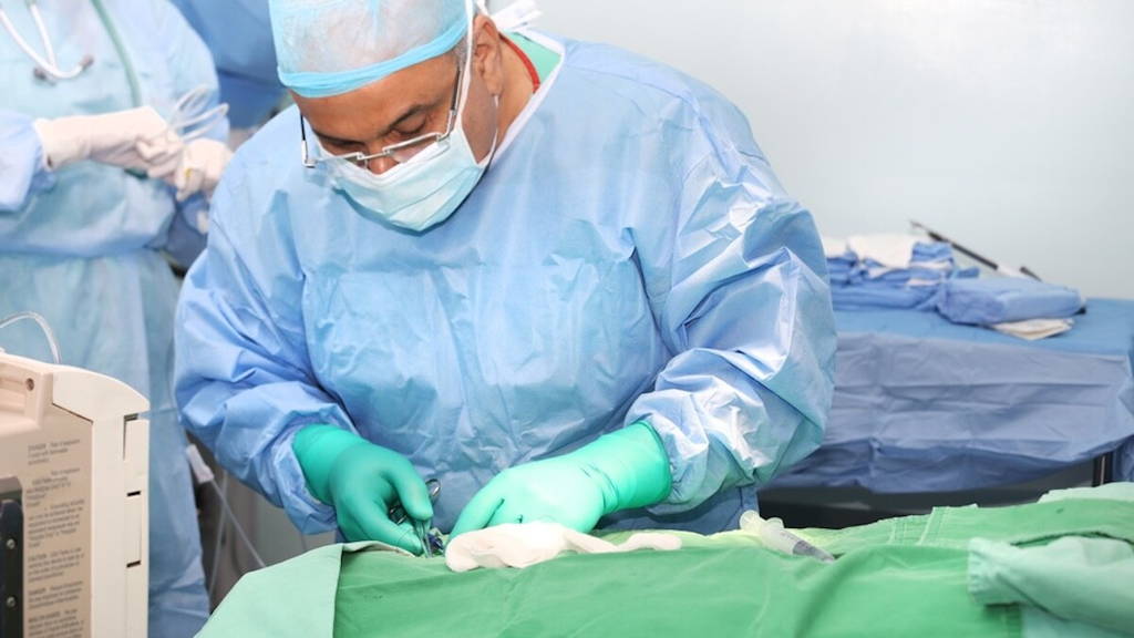 Doctor using tools in a surgery
