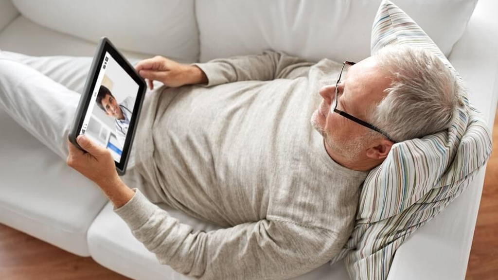 senior patient having video chat with doctor