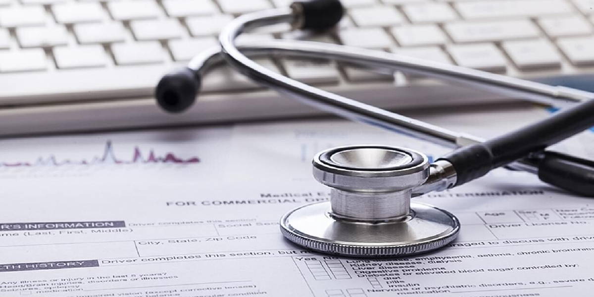 Clinic. Stethoscope with financial on the desk.