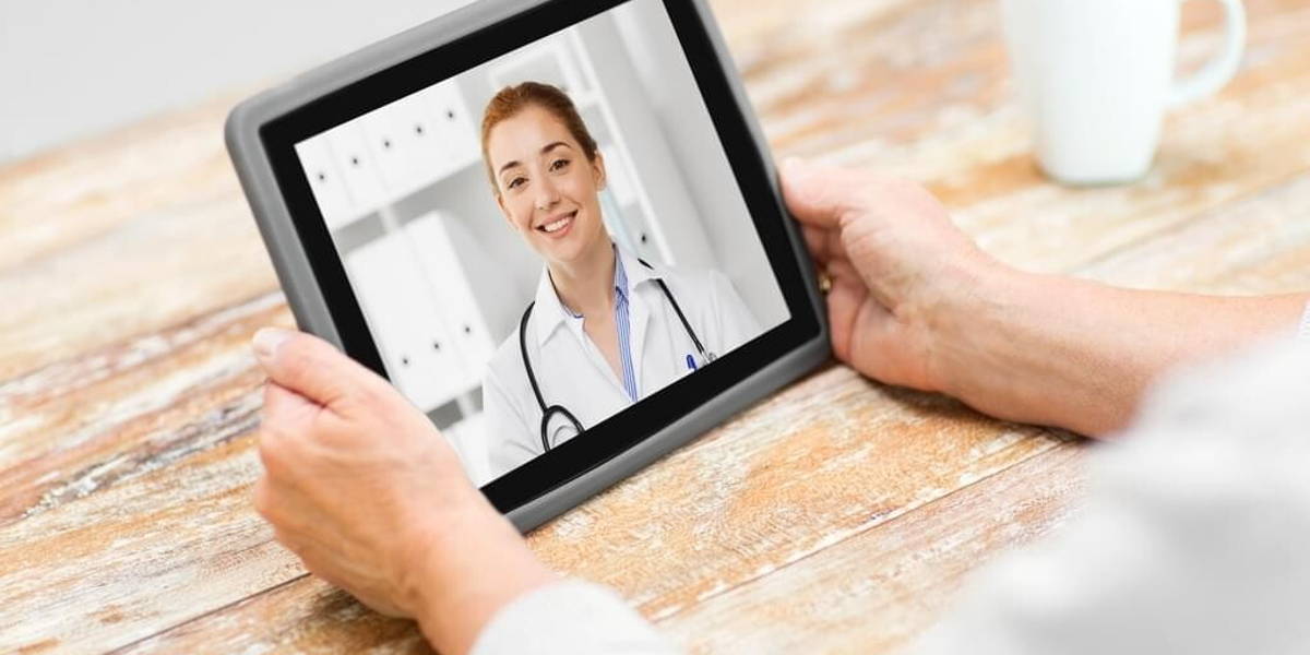 senior woman patient having video call with doctor
