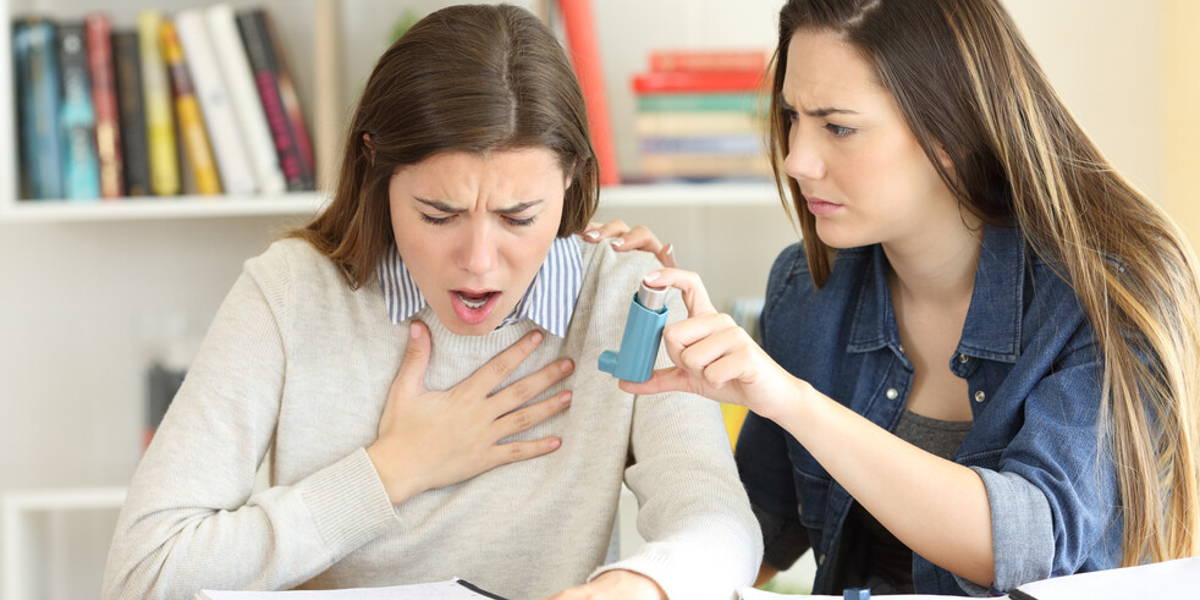 Student helping her asmathic friend