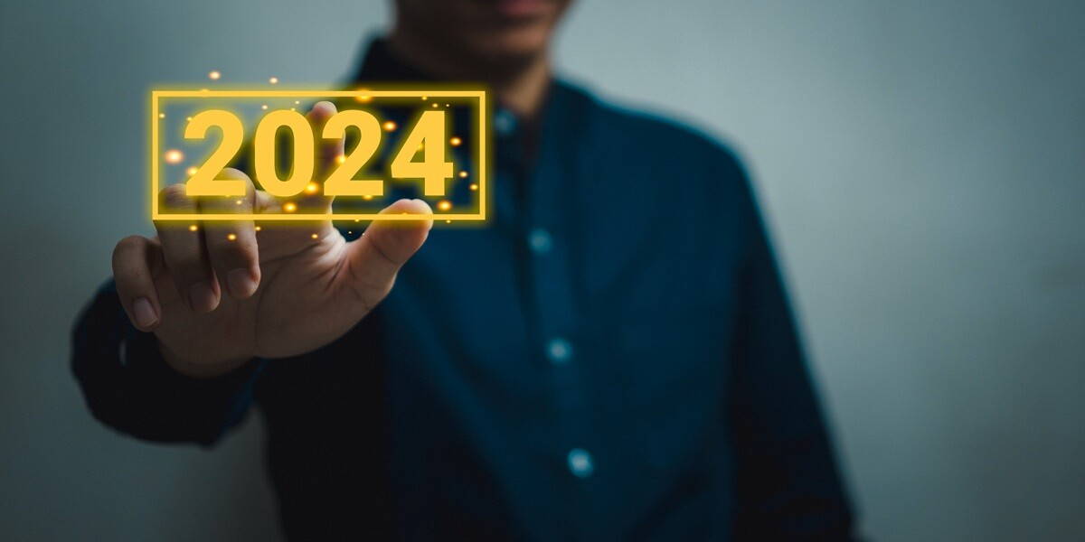 Hand man touching button 2024 new year.