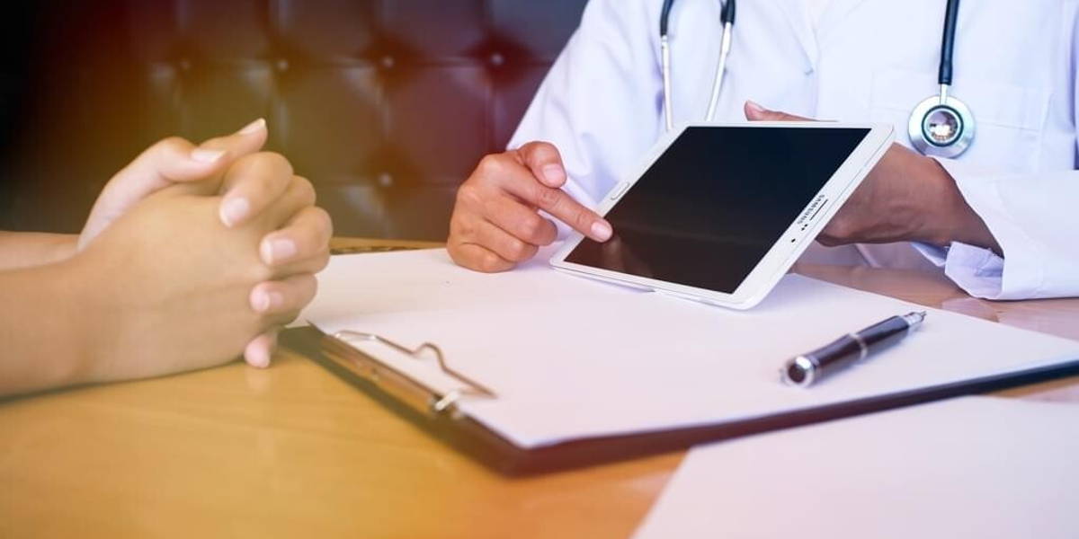 Professional medical doctor in white uniform gown coat interview