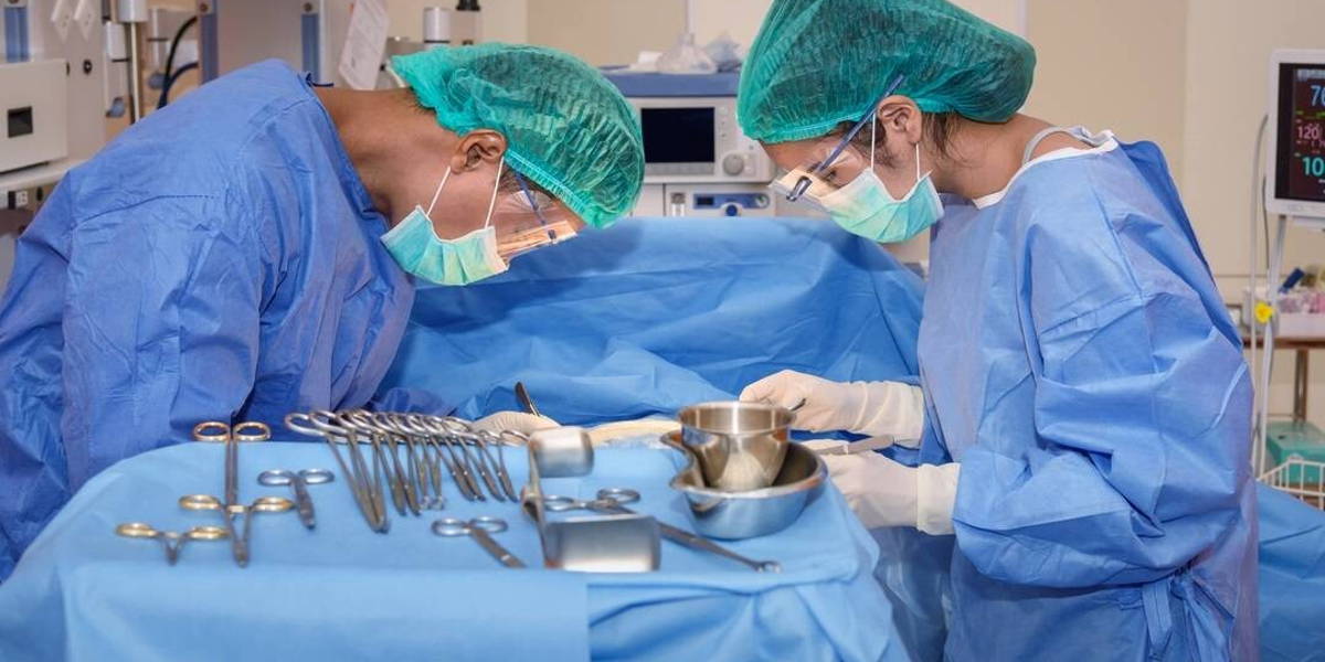 team professional surgeon in the operating room