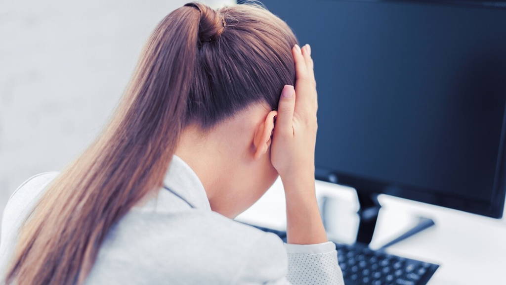stressed woman with computer