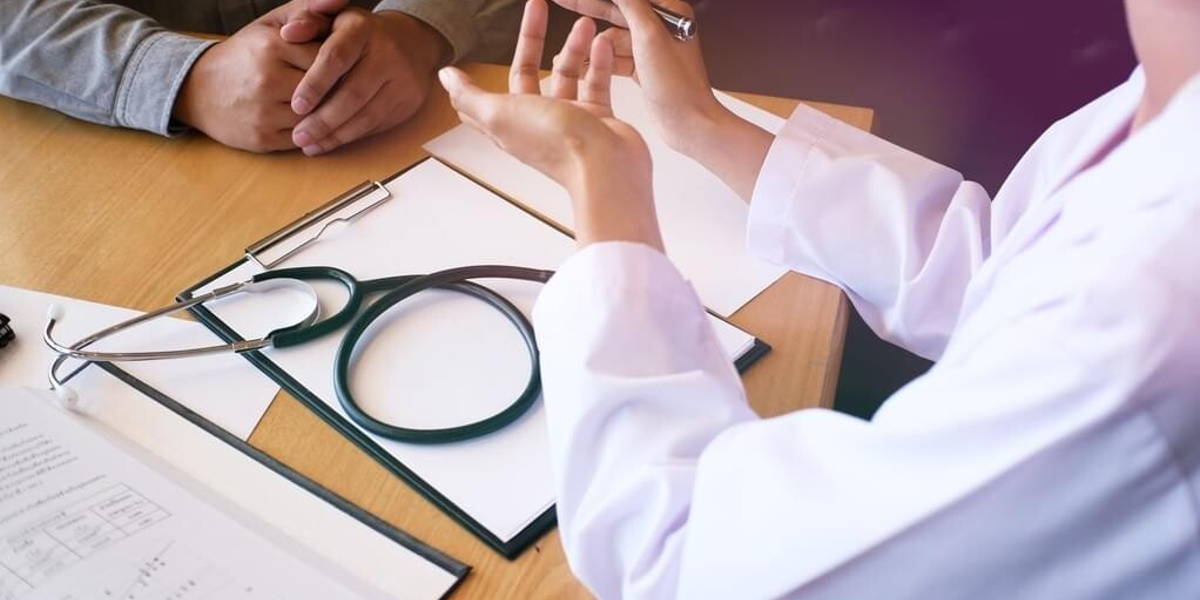 Professional medical doctor in white uniform gown coat interview