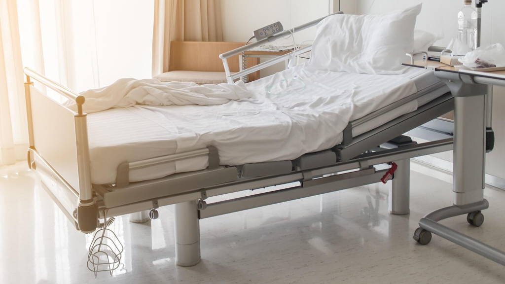 Soft focus background of electrical adjustable patient bed in ho