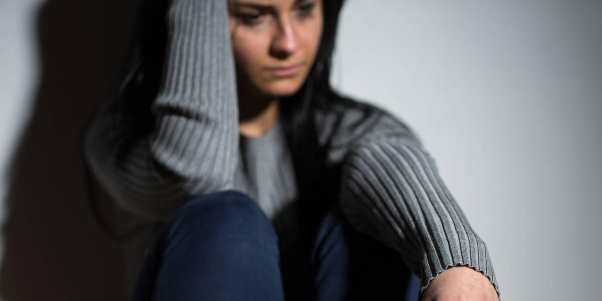 Depressie-Vrouw-Muur