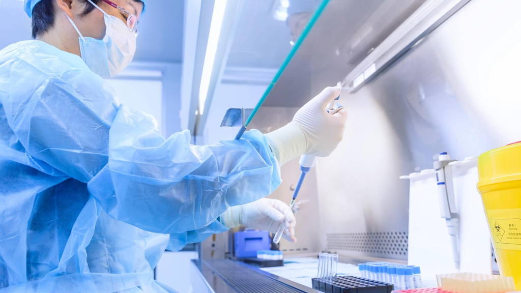 The scientist experimented in the laboratory