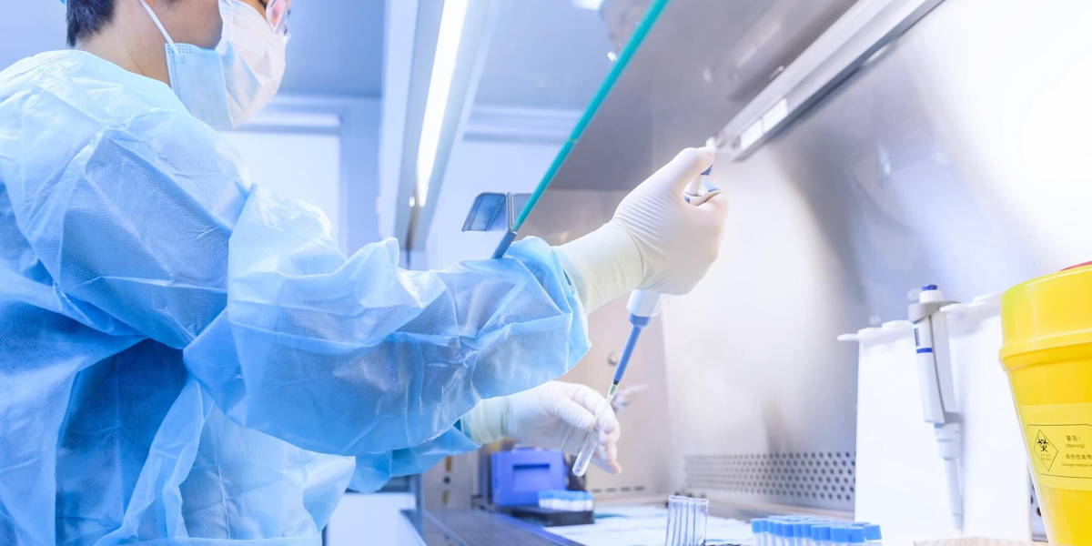 The scientist experimented in the laboratory