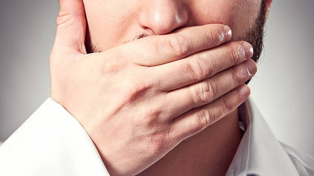 Silence-hand-to-mouth-ICTH