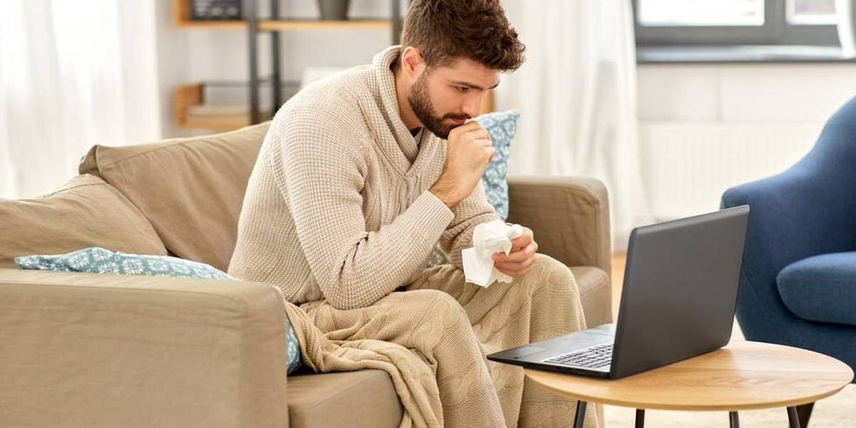 Man-ziek-bank-laptop