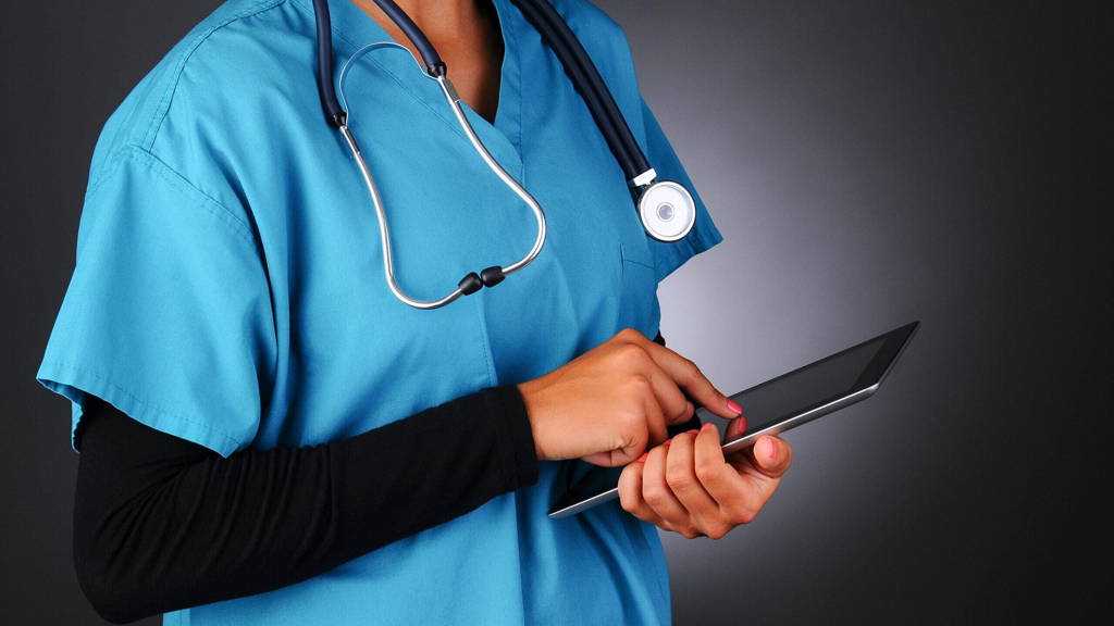 Nurse Using Tablet Computer