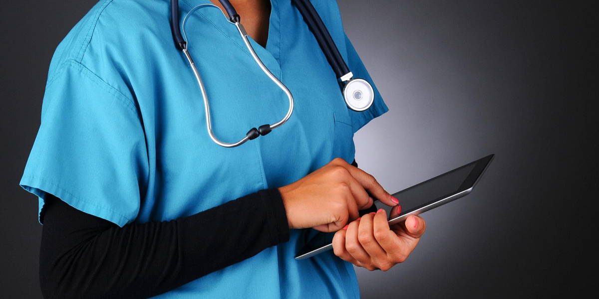 Nurse Using Tablet Computer