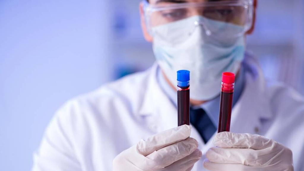 Lab assistant testing blood samples in hospital