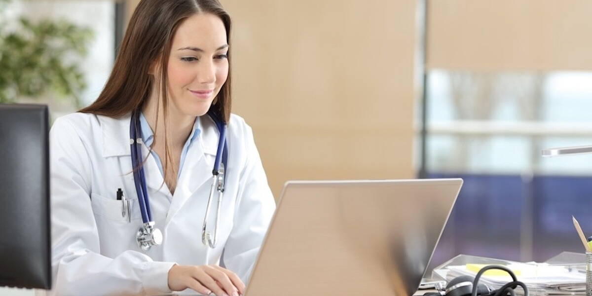 Doctor working on line in a consultation