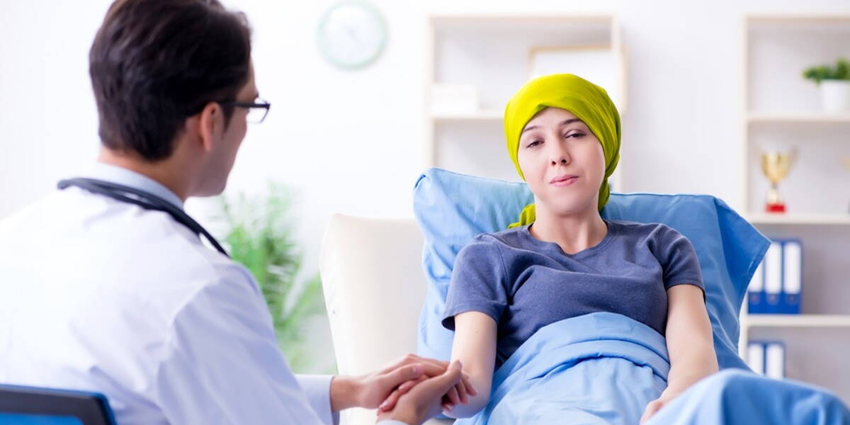 Cancer patient visiting doctor for medical consultation in clini