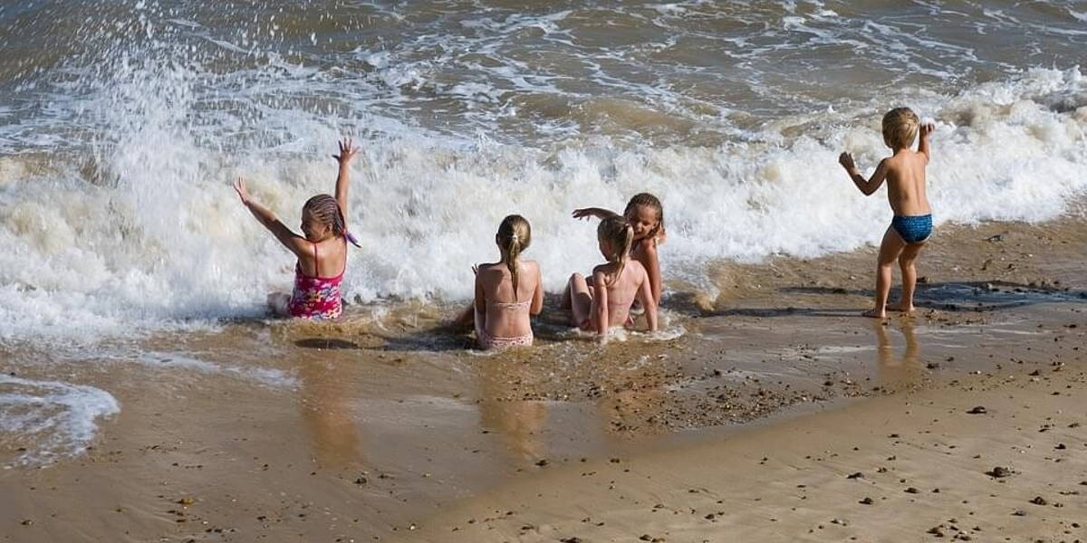 Zon-strand-kinderen