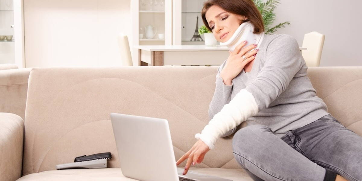 Woman after car accident suffering at home