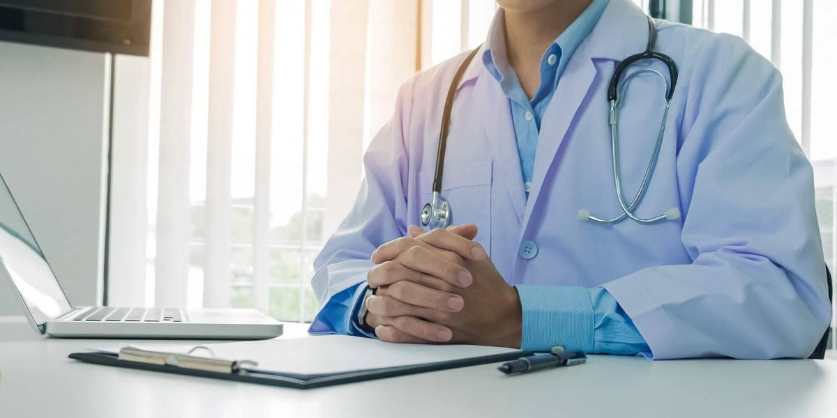 patient listening intently to a male doctor explaining patient s